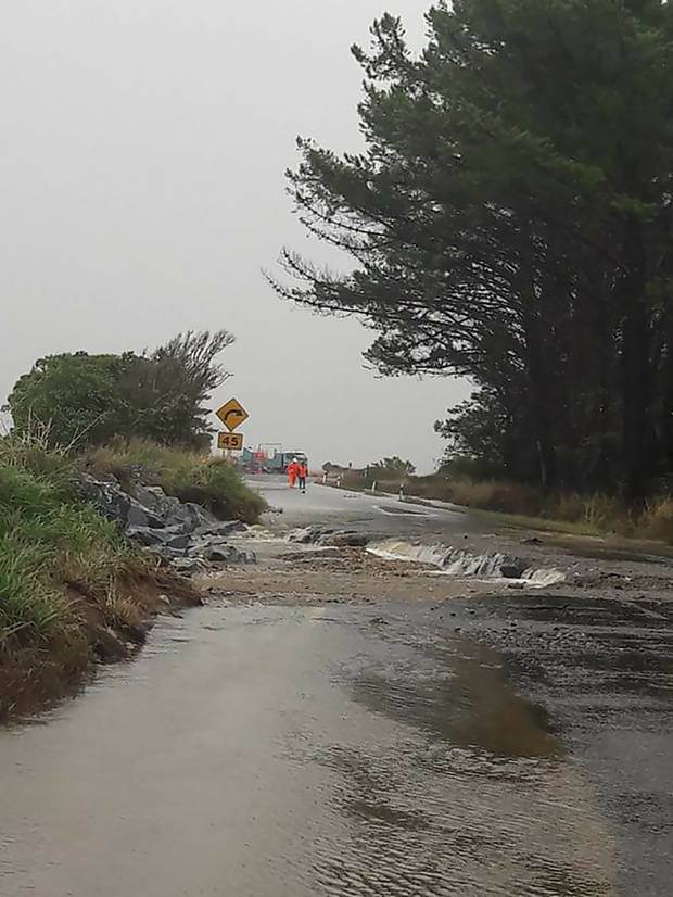 Road washed away at Puponga near Takaka as as ex-tropical cyclone Gita lashes the South Island of New Zealand. Photo / Nicola Hartless 
