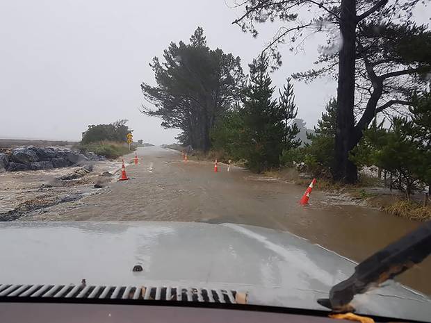 Road washed out at Takaka 20 February 2018 as ex-tropical cyclone Gita hits the south island of New Zealand. Photo / Zara Lavanchy