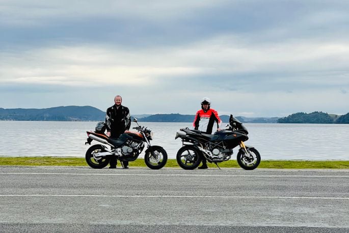 Nick Grant and his dad on their bikes - Nick says: “Riding bikes is one of my happy places. It’s an amazing feeling, but you need to have the skills to earn that right of riding safely.” Photo / Supplied