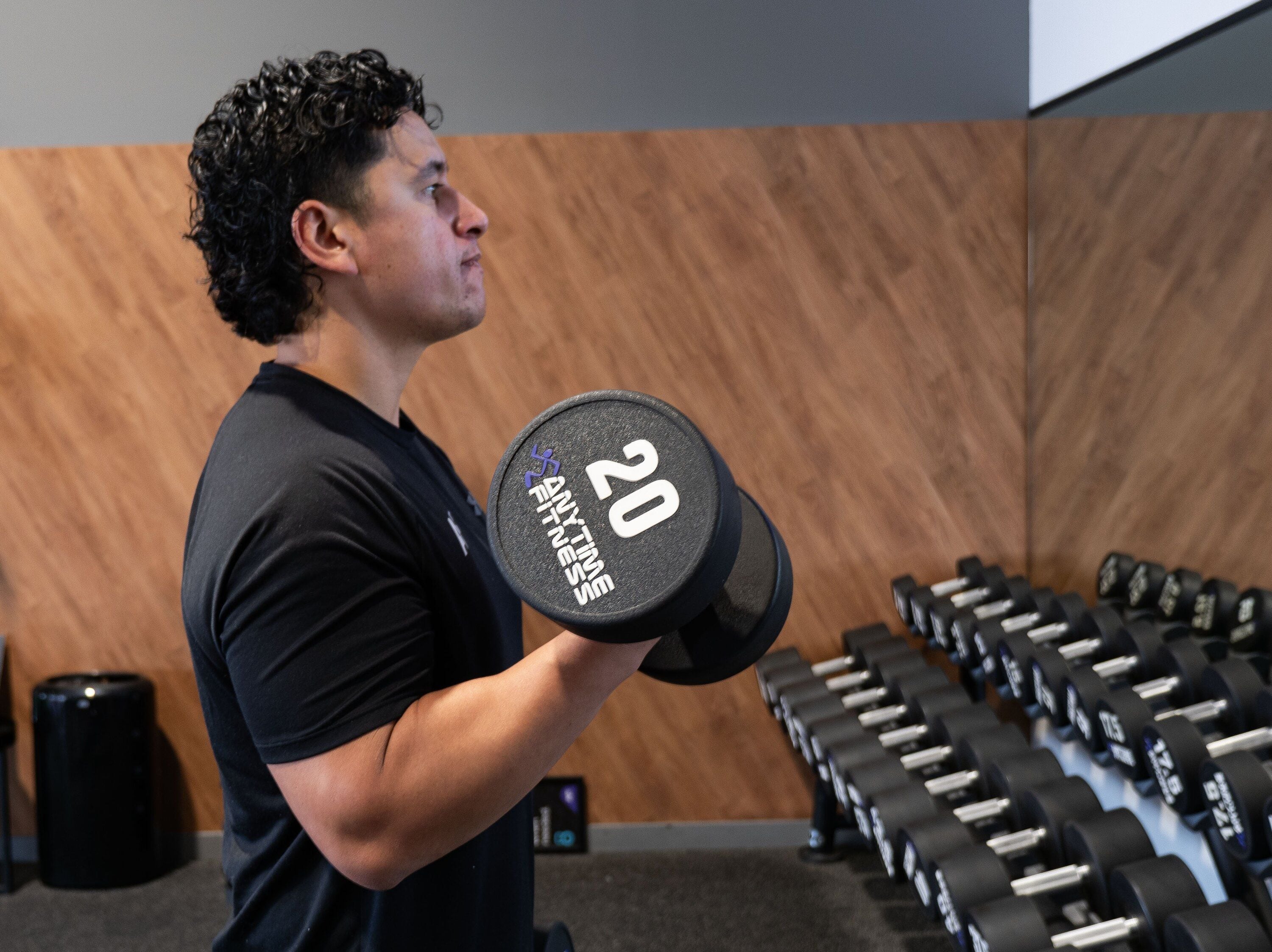 Levi Quitta gets the blood pumping with a bicep curl. Photo / Tom Eley