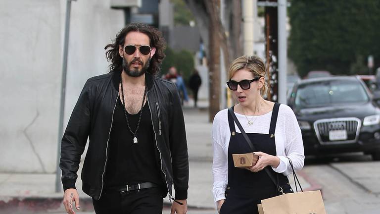Russell Brand enjoys a relaxing day out with wife Laura and dog Bear