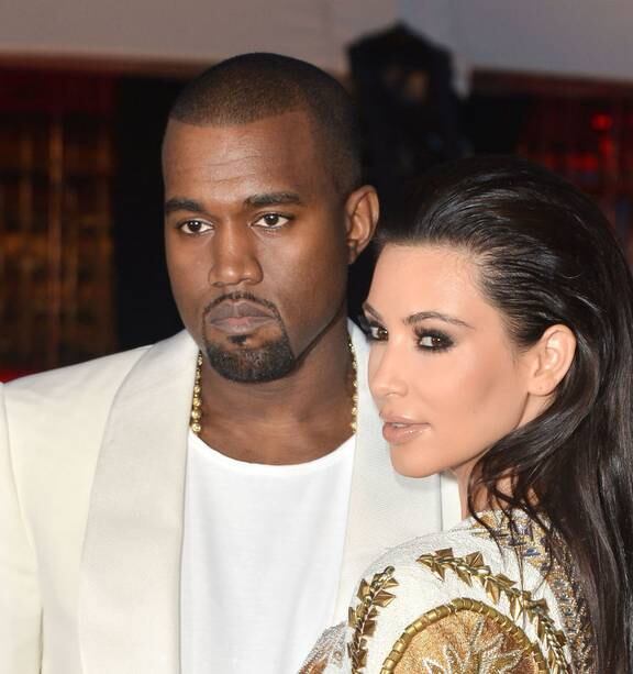 Kim Kardashian West and husband Kanye West leave K.West's Sunday News  Photo - Getty Images