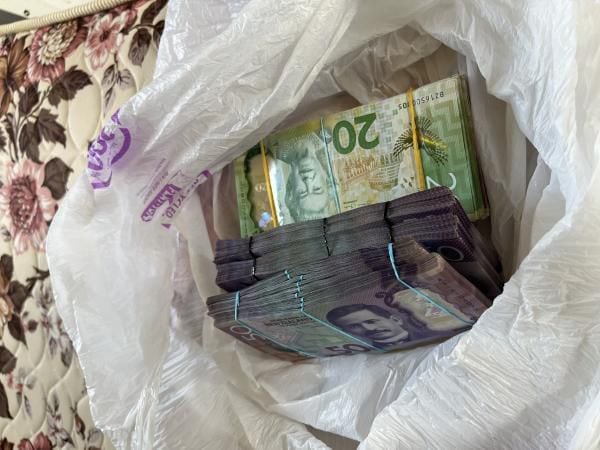 Approximately $50,000 of cash was seized after search warrants in the Bay of Plenty and Tokoroa.