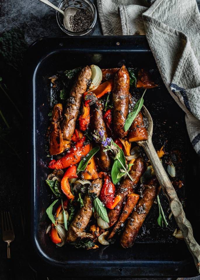 Sausage and kūmara traybake with sticky maple, jalapeno and chia seed jam. Photo / Olivia Moore @thatgreenolive