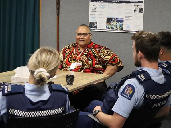 Recruits spend time in small groups learning from each volunteer. Here volunteer Fa'alogo speaks to recruits about Pacific culture. Photo / supplied