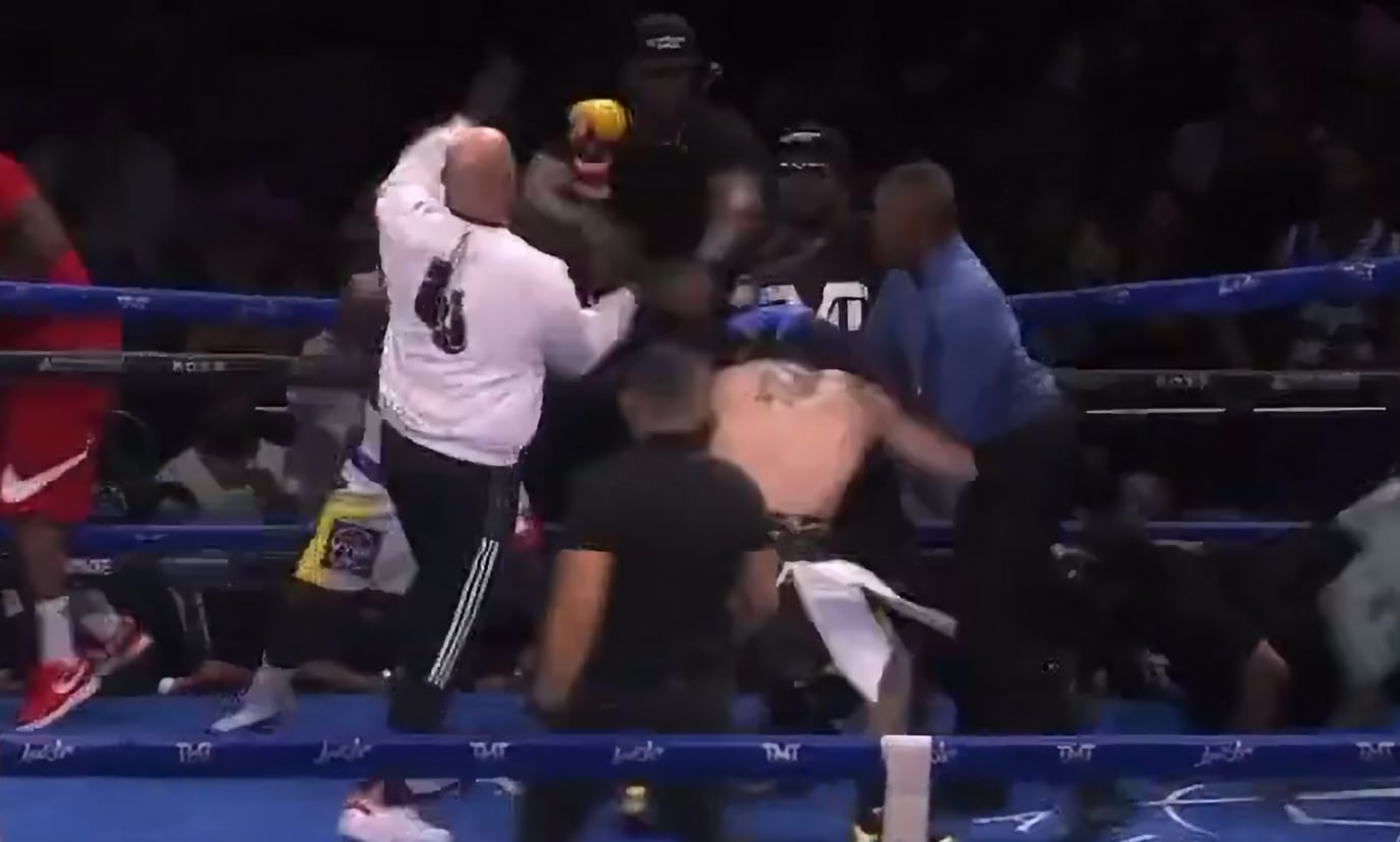 Floyd Mayweather rocking the 🇵🇭 on his trunks! A wild scuffle ensued  after the Floyd Mayweather-John Gotti III fight was stopped 😳