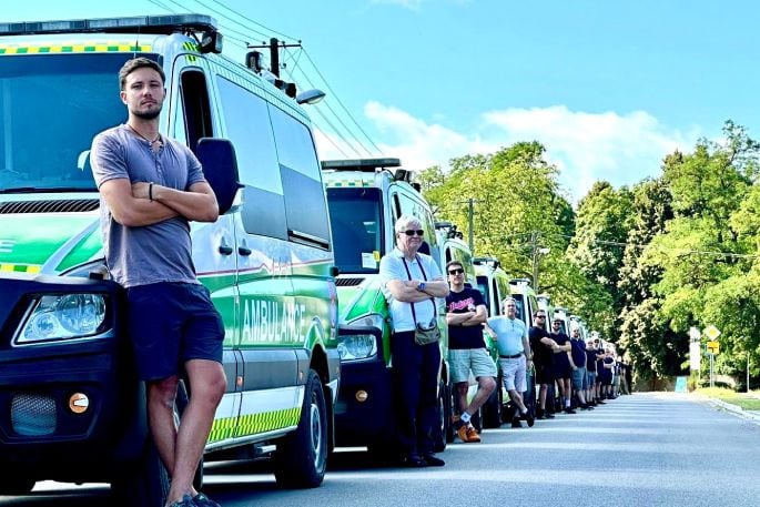 Kiwi K.A.R.E driver, Toni Lttermann, in front of the convoy of 16 drivers from New Zealand, Poland, France, Germany, the United States, Canada, the U.K., and Ukraine. 