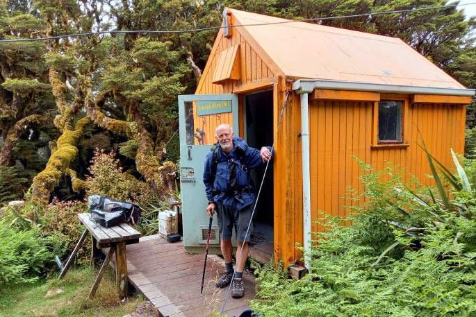 Duncan Smith, 79, at the Drachophylum Hut in the Tararua Mountain Range on the Te Araroa Trail. 