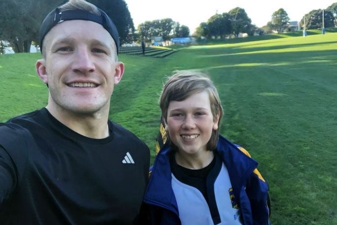 ‘Little Ref’ with one of his great All Black heroes, Damien McKenzie. Photo: supplied.