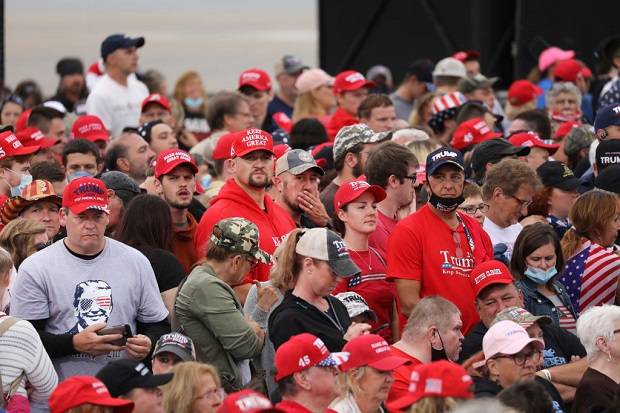 Supporters wait to see President Donald Trump. Photo / Getty Images