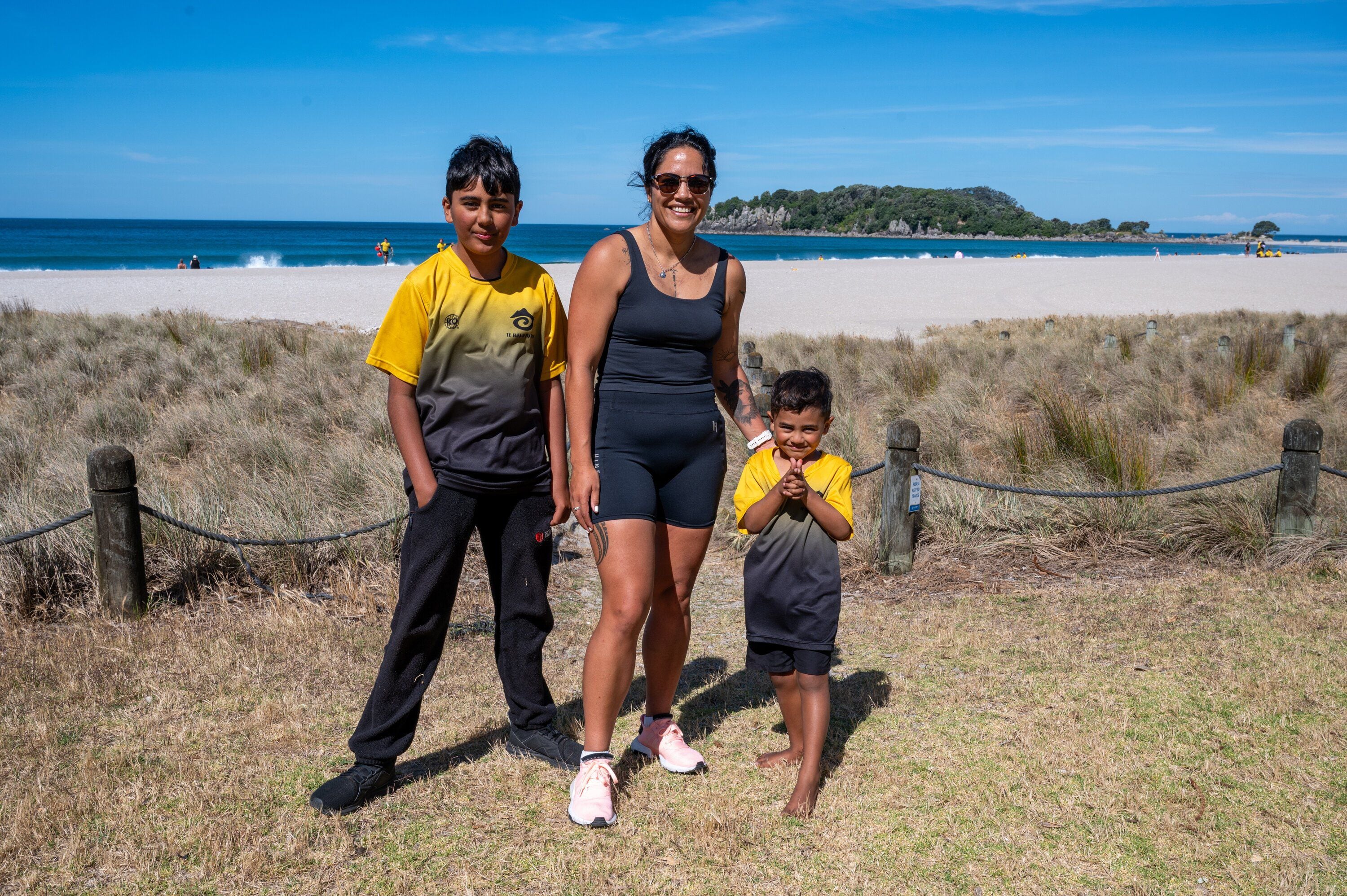 Summer Kerr with her sons Halo and Astore Taoho. She plans to do 12 climbs. Photo / David Hall