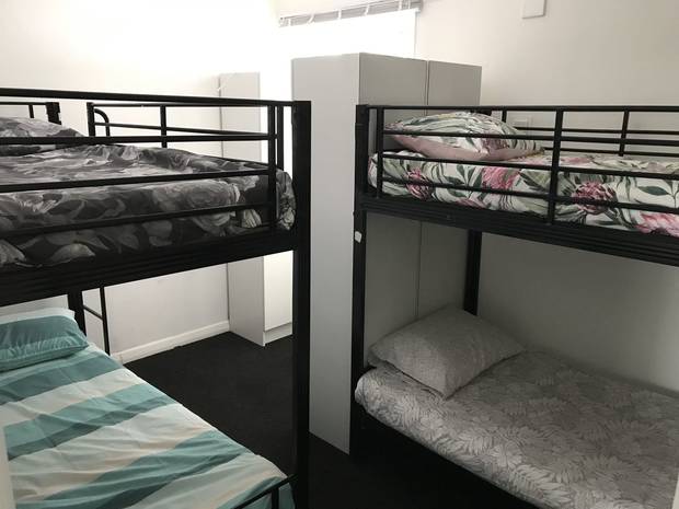 A Sandringham rental has crammed eight bunks beds into two bedrooms. Photo / TradeMe