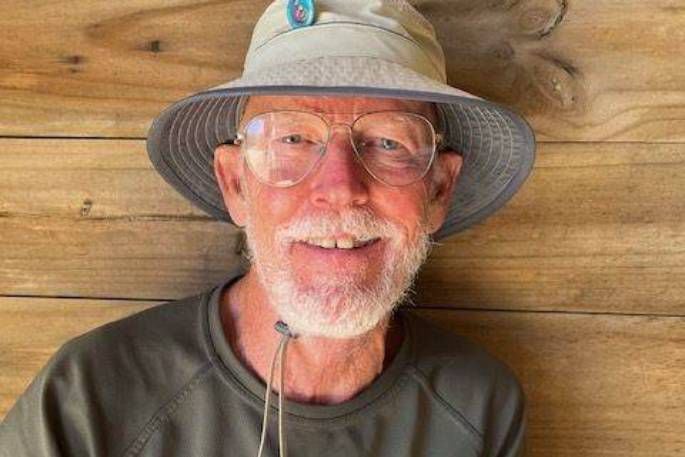 Duncan Smith, 79, taking a break from walking the 90-Mile Beach section of Te Araroa Trail. 