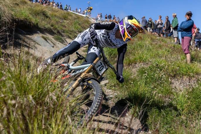 Jenna Hastings zooms down the slopes at Coronet Peak to win the women’s downhill. Photo / MTBNZ