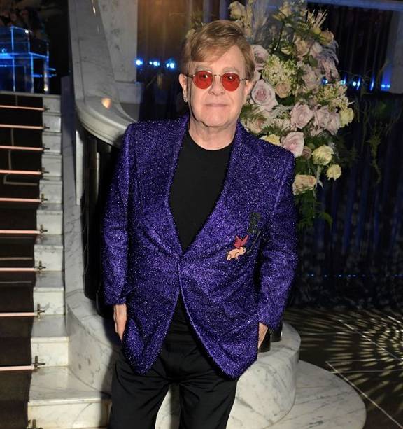 Elton John's Life in Looks Proves He's Always Had a Flair for Style