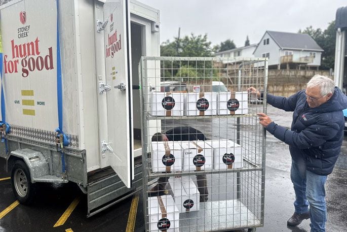 Bill Osborne, a board member of the Hunt for Good Charitable Trust, delivers to the Tauranga Community Food Bank.