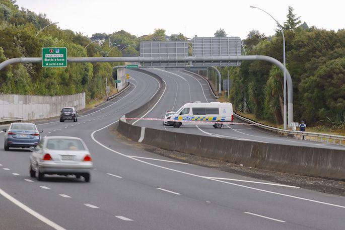 Takitimu Drive was closed while police conducted a scene examination. Photo / Daniel Hines, SunLive