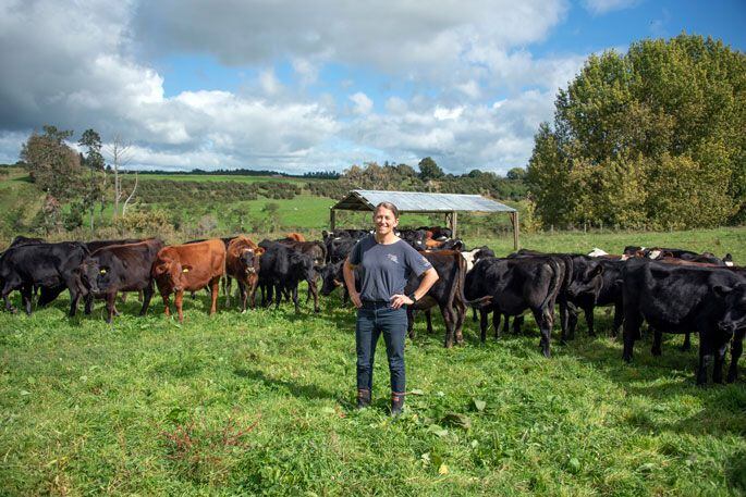 Jo with the thriving calves. Photo: Catherine Fry.