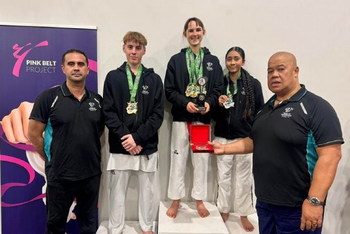 Coach Joe Callaghan (left), with Sam Hallinan, Ella Wilce, Gabby Callaghan and Master Kesi O'Neill.