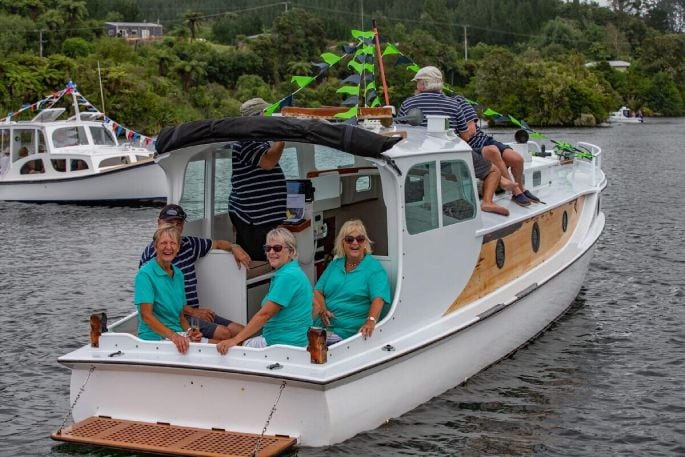 Participants enjoying a previous Lake Rotoiti Classic and Wooden Boat Parade.