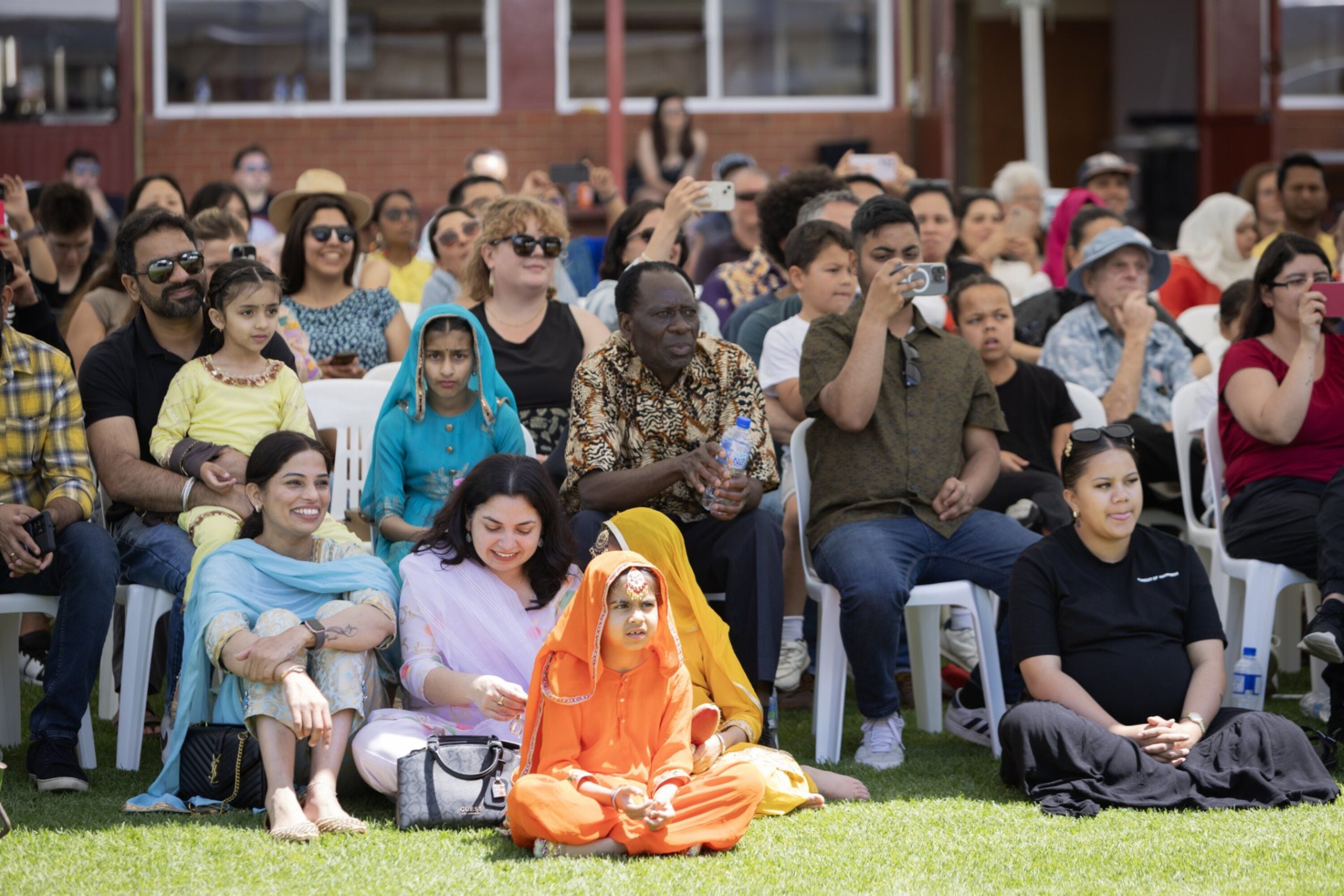  Hundreds of migrants were welcomed on to the Maungatapu Marae. Photo / Tessa Chrisp Photography