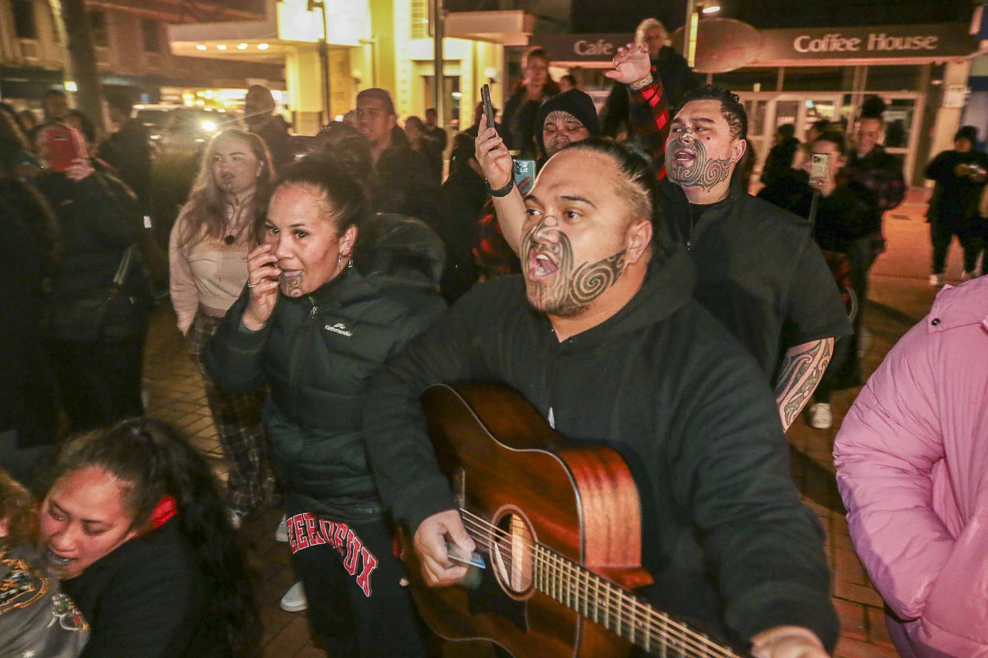 Protesters sung waiata to try to drown out speakers at Julian Batchelor's Stop Co-Governance meeting. Photo / Paul Taylor