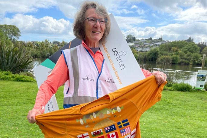 Gordon Carmichael Reserve parkrun run director Lesley Warner-Bird with the T-shirt. Photo / Supplied