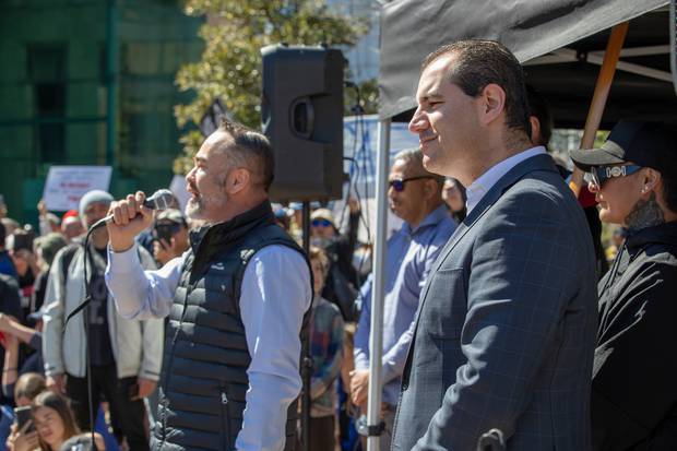 Co-leaders of Advance NZ, Billy Te Kahika, left, and Jami-Lee Ross address the crowd at an anti-lockdown rally in Auckland. Photo / Peter Meecham