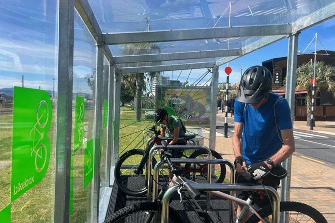 Brian Breen and Leonie Taylor lock up their bikes at The Strand Bikebox. Photo: Tauranga City Council