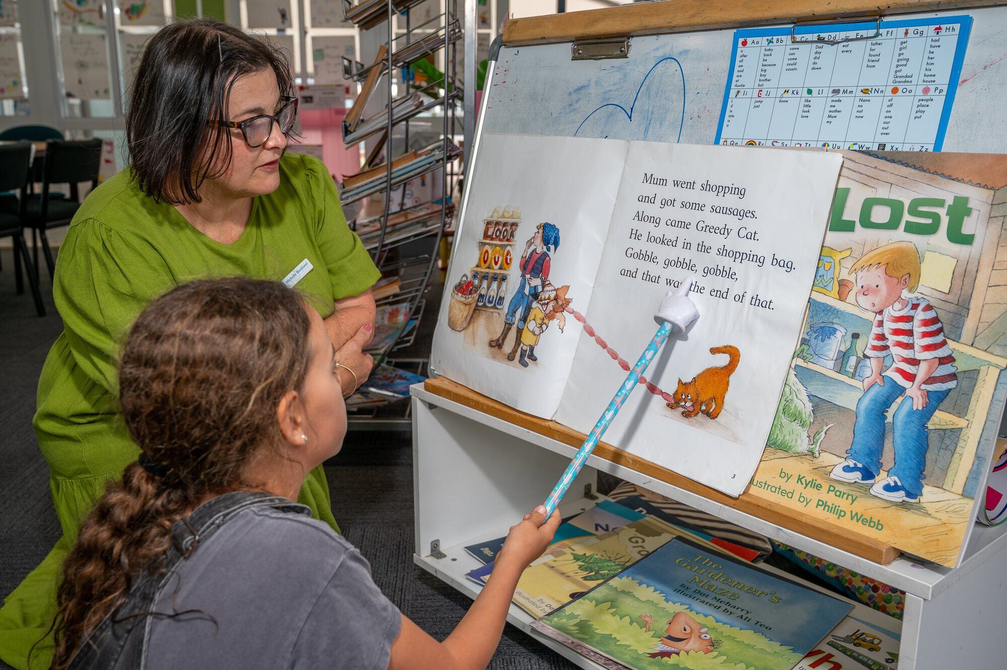  Ōmokoroa Point School Reading Mileage Programme student Mila Procter, 9, and tutor Michelle Buckland. Photo / David Hall