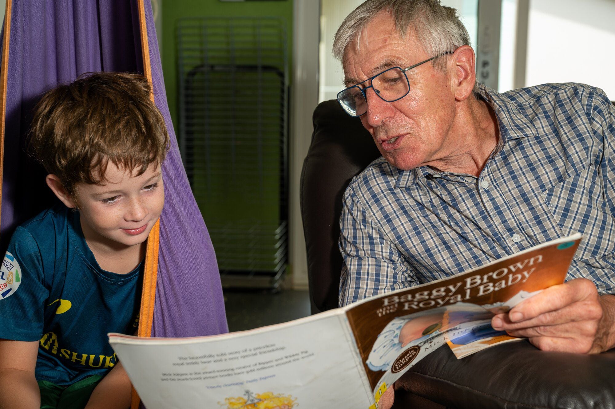  Ōmokoroa Point School Reading Mileage Programme student Eddi Carter, 8, and tutor Peter Goad. Photo / David Hall