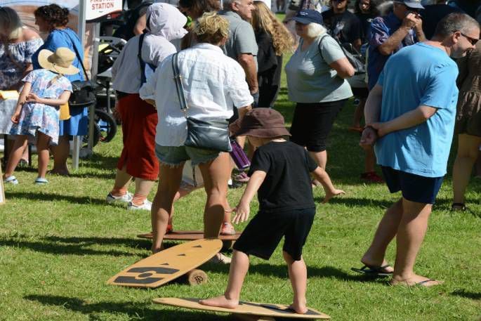 Children can pick up a Treaty Storyboard Trail workbook from the He Iwi Kotahi merchandise stand and enter a draw to win prizes. Photo / Supplied