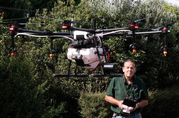 Pilot Warrick Funnell operates Agdrone's agricultural spraying drone.