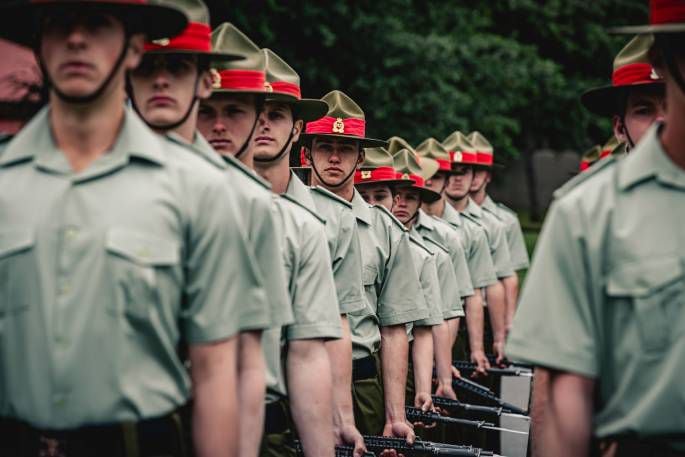 Private Schweizer stands at ease while the platoon wait for the command to stand to attention and prepare to march onto the parade ground for the graduation parade. Photo / supplied