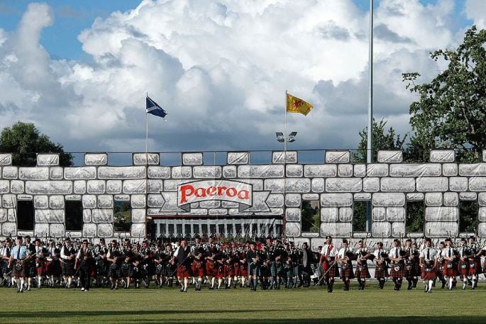 March from Paeroa Castle at the Evening Tattoo of the Paeroa Highland Games. Photo / Rod Baker-Clemas