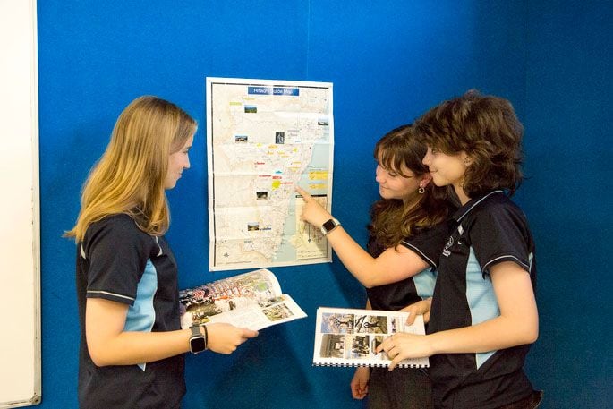 Isabelle Stockdale, left, Ava McCarthy and Emma Hunt prepare for the task ahead.