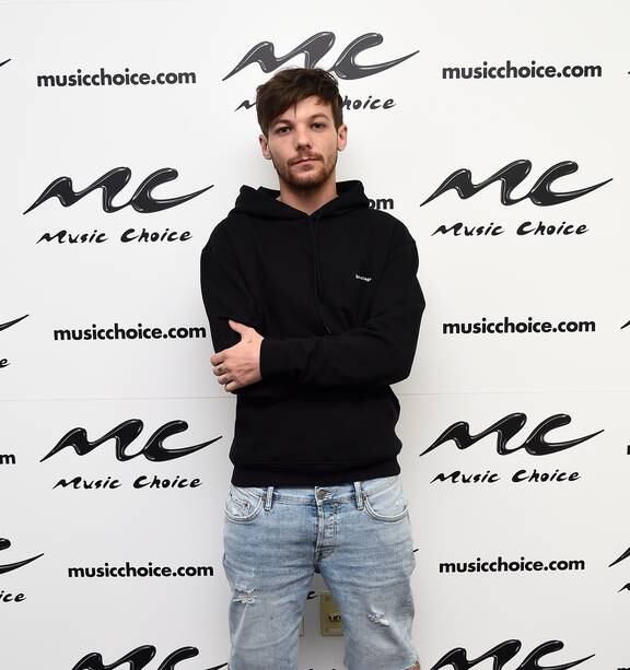 Louis Tomlinson's family receiving pornographic images, death threats - NZ  Herald