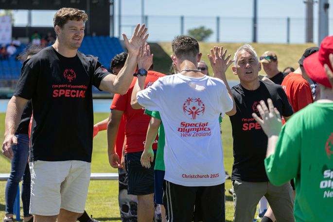 Games Ambassadors Scott Barrett and Jason Gunn thank athletes after a friendly football match at Ngā Puna Wai to mark one year until the start of the National Summer Games.