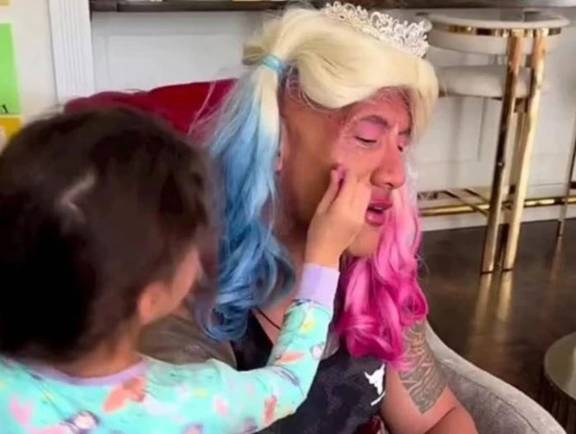 Watch: Dwayne Johnson gets pink face paint in daughters' makeover