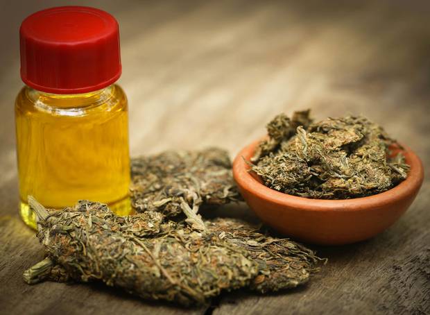 She was provided with cannabis oil (stock image) by someone she met online, and says within eight months she was returning clear blood scans. Photo / 123rf