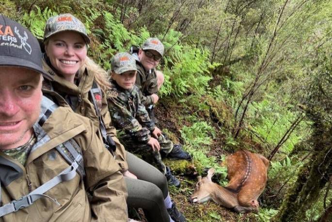 (From left): Jamie, Amie, Fletcher and James Fairbairn with the deer they shot on New Year's Eve.