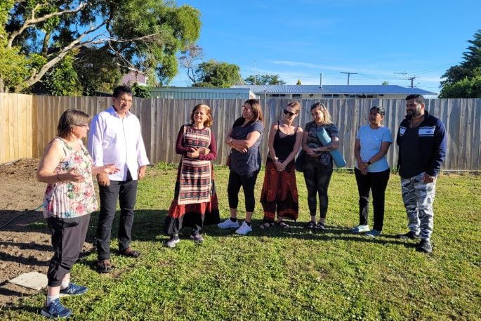 Community garden manager Dr Julia Anne explains the project to volunteers. Photo / Supplied