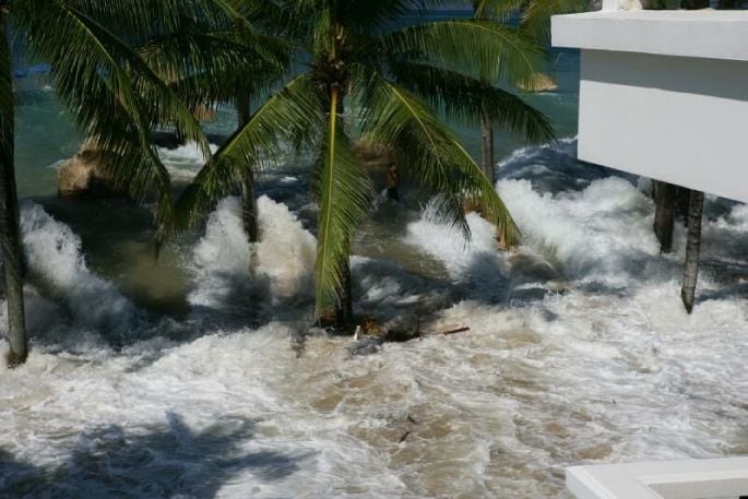 The tsunami wave hitting in Thailand. Photo/ Bob Hooker.