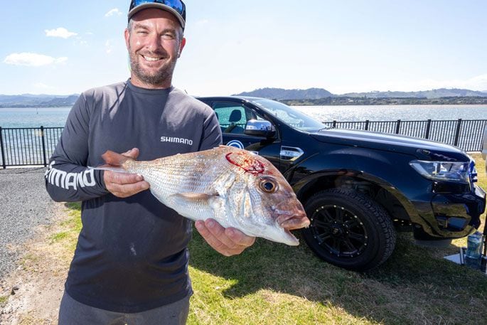 Tournament host Ryan Fox got amongst the fishing at The Fox on Friday. Photo / Jamie Troughton/Dscribe Media