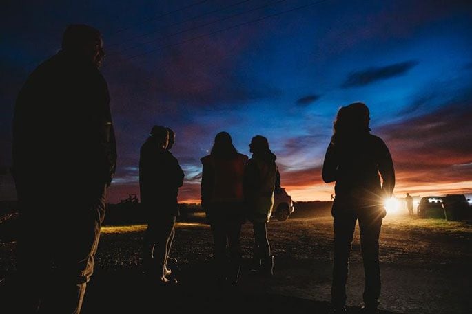 People gathered for the ceremony at dawn.