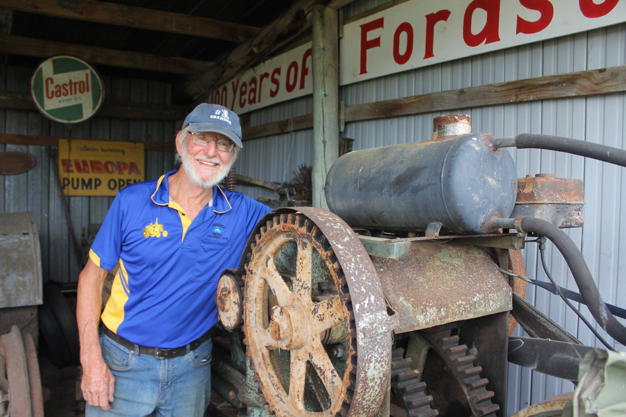  Larry Williams with a vintage hay baler. Photo/Debbie Griffiths