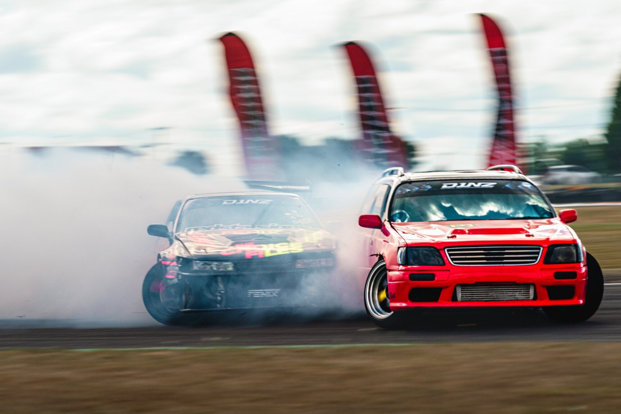  Te Puke’s Zac Green leads Rotorua driver Guy Maxwell in Round Two of D1NZ at Taupo Motorsport Park in February.  Photo / Ray Clarke Photography.