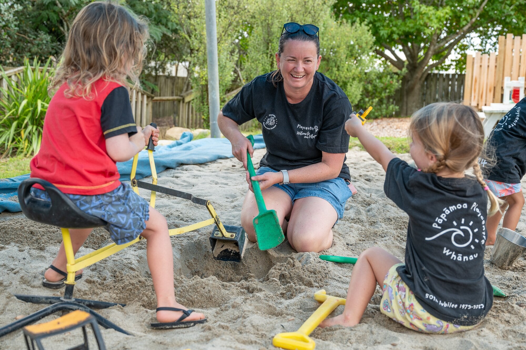  Pāpāmoa Playcentre child Terry Devcich, teacher Alex McCarthy and child Amelie McCarthy. Photo / David Hall