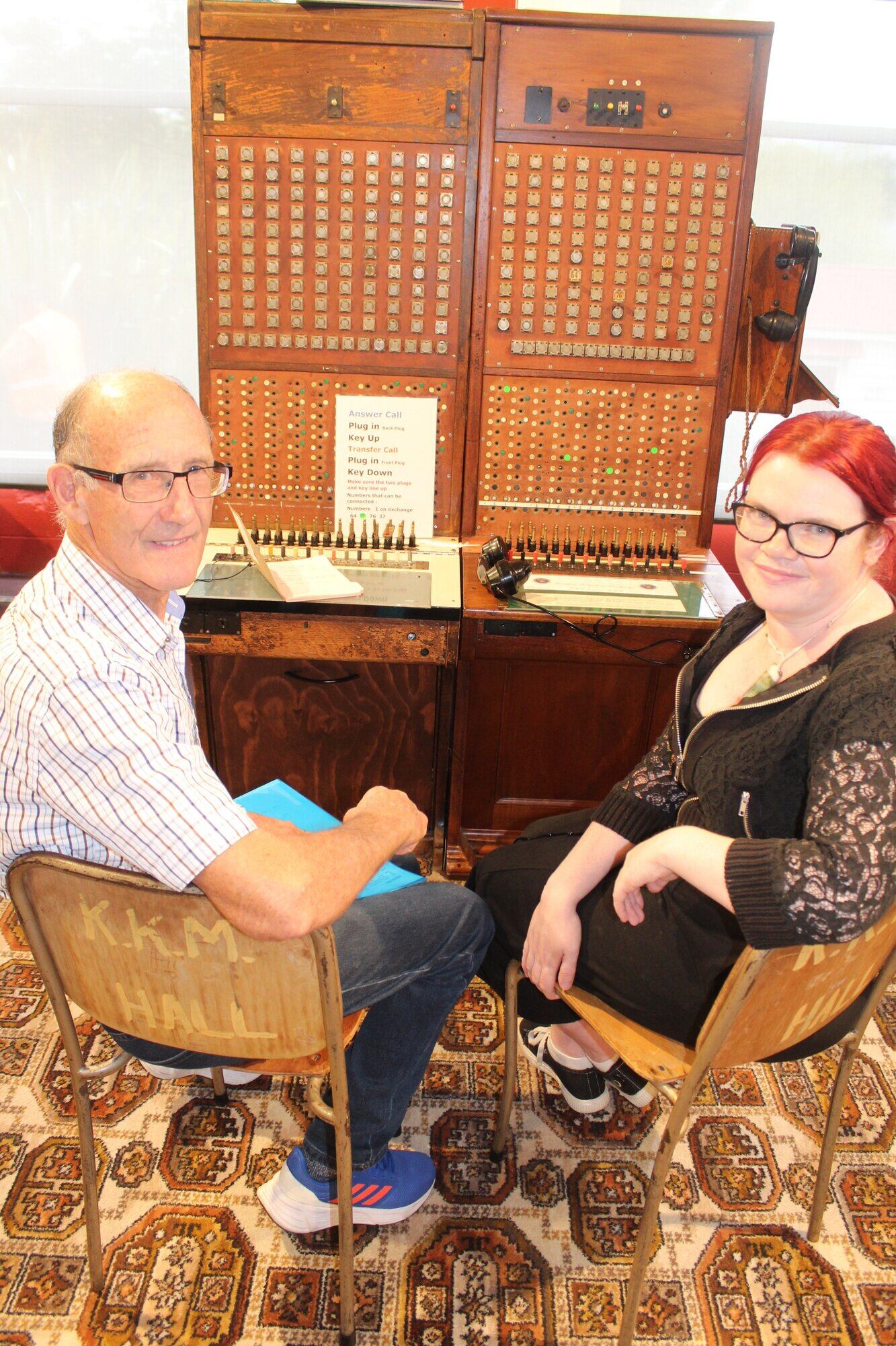  Geoff and Carly in front of the telephone exchange. Photo / Rebecca Mauger