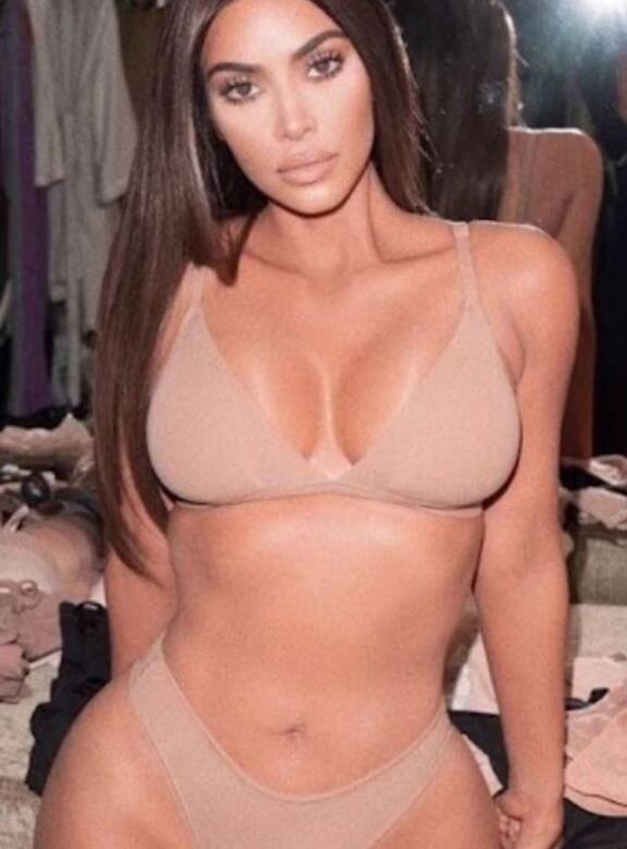 Kim Kardashian flaunts boobs in tiny red bikini in unseen selfie